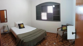 Quarto em Casa Compartilhada